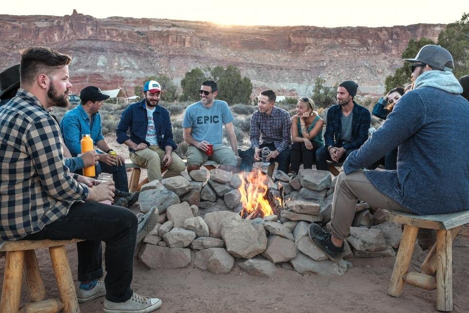 Community members gathered around a fire